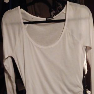 Never worn tunic with side ruching,holes for your thumbs on the sleeves size s